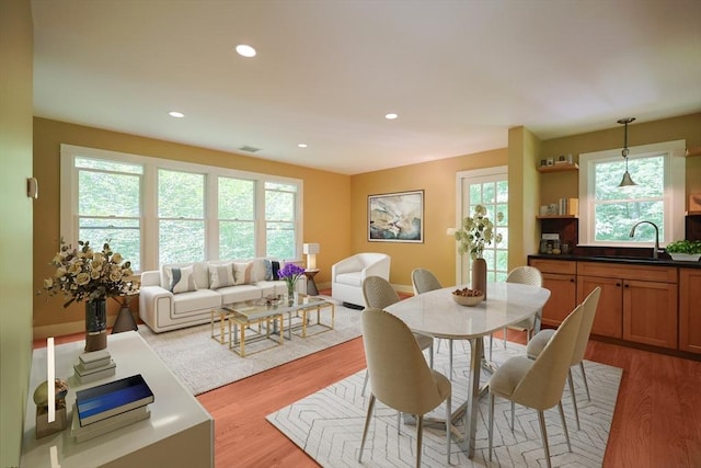 95 Glendale Rd, Sharon, MA 02067 - dining space featuring light wood-type flooring and recessed lighting