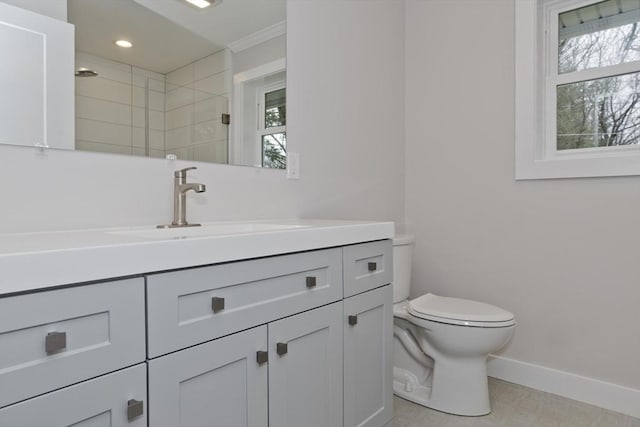 full bathroom featuring toilet, recessed lighting, vanity, baseboards, and tiled shower