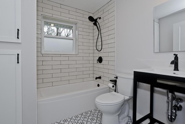 bathroom featuring shower / bathing tub combination, vanity, and toilet