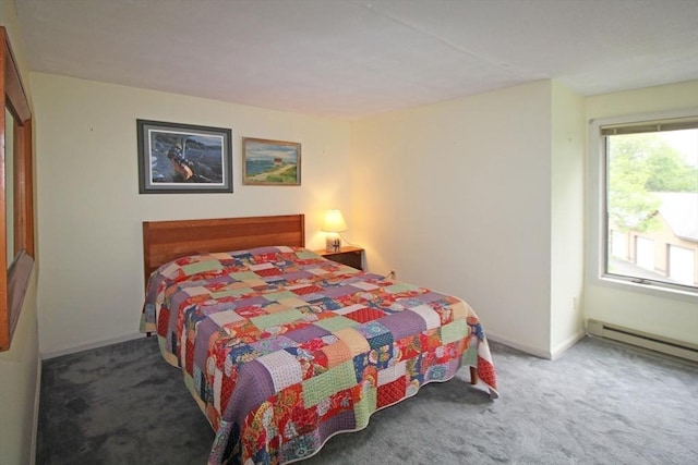 575 Bridge Rd Unit 11-2, Northampton, MA 01060 - carpeted bedroom featuring baseboards and a baseboard radiator