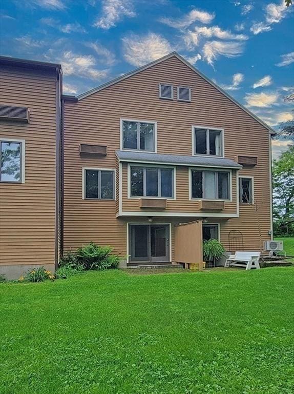 575 Bridge Rd Unit 11-2, Northampton, MA 01060 - back of house featuring a yard