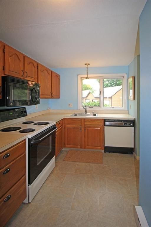 575 Bridge Rd Unit 11-2, Northampton, MA 01060 - kitchen featuring black microwave, electric stove, dishwashing machine, a sink, and light countertops