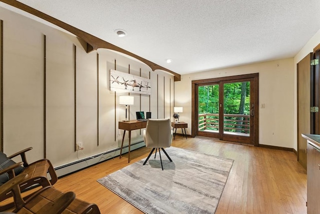 26 Ashfield Ln, South Hadley, MA 01075 - office space with a baseboard radiator, a textured ceiling, and wood finished floors