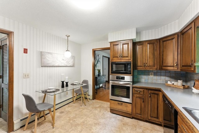 26 Ashfield Ln, South Hadley, MA 01075 - kitchen featuring black appliances, backsplash, decorative light fixtures, wallpapered walls, and a baseboard radiator