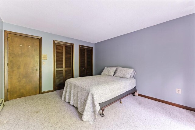 26 Ashfield Ln, South Hadley, MA 01075 - carpeted bedroom with multiple closets and baseboards