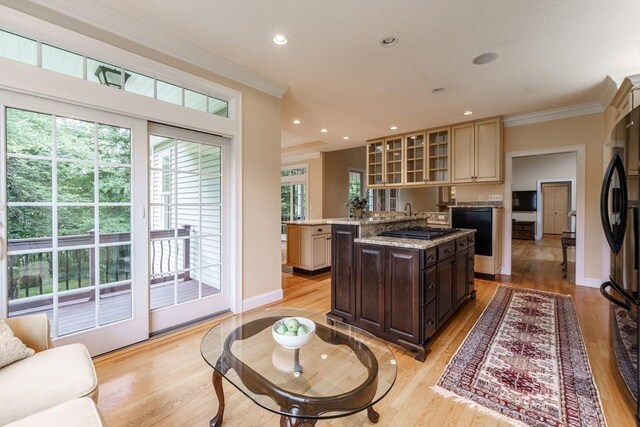 9 Windsor Ln, East Longmeadow, MA 01028 - kitchen with crown molding, freestanding refrigerator, a kitchen island with sink, light wood-type flooring, and recessed lighting