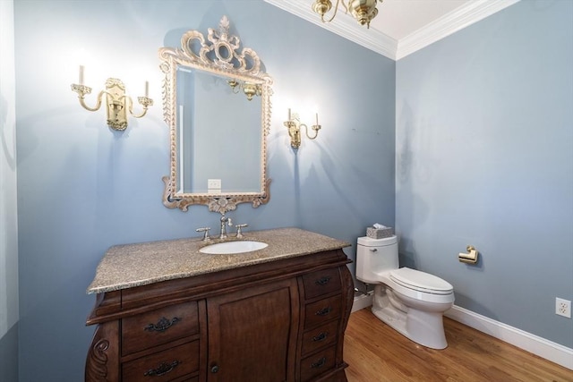 9 Windsor Ln, East Longmeadow, MA 01028 - half bath with ornamental molding, wood finished floors, and vanity