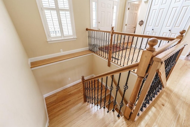 9 Windsor Ln, East Longmeadow, MA 01028 - stairway with wood finished floors and baseboards