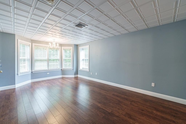 9 Windsor Ln, East Longmeadow, MA 01028 - spare room with a chandelier and dark wood-type flooring