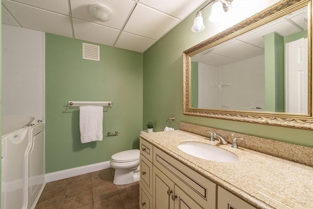 9 Windsor Ln, East Longmeadow, MA 01028 - full bathroom featuring a drop ceiling, vanity, and tile patterned flooring