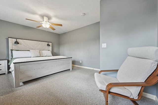 carpeted bedroom with baseboards and ceiling fan