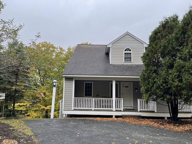 9201 Mountainside Dr Unit 9201, Hancock, MA 01237 - view of front of property featuring a porch and roof with shingles