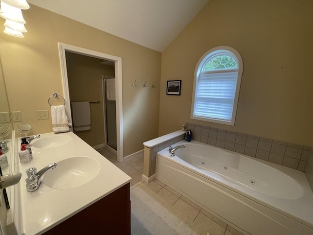 9201 Mountainside Dr Unit 9201, Hancock, MA 01237 - full bathroom featuring tile patterned floors, a whirlpool tub, double vanity, lofted ceiling, and a stall shower