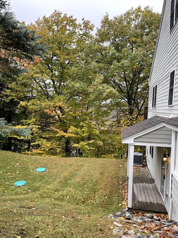 9201 Mountainside Dr Unit 9201, Hancock, MA 01237 - view of grassy yard with central air condition unit