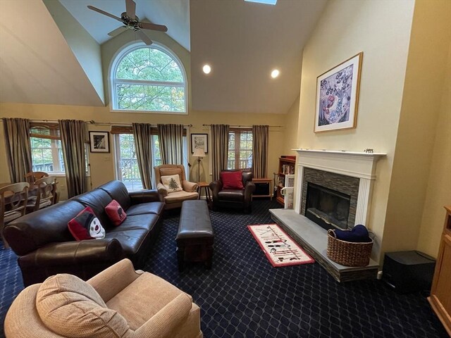 9201 Mountainside Dr Unit 9201, Hancock, MA 01237 - living area featuring carpet floors, high vaulted ceiling, healthy amount of natural light, and ceiling fan