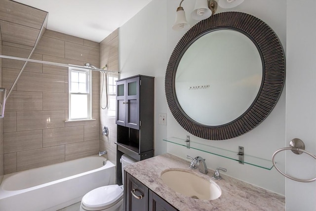 full bath featuring vanity, toilet, and  shower combination