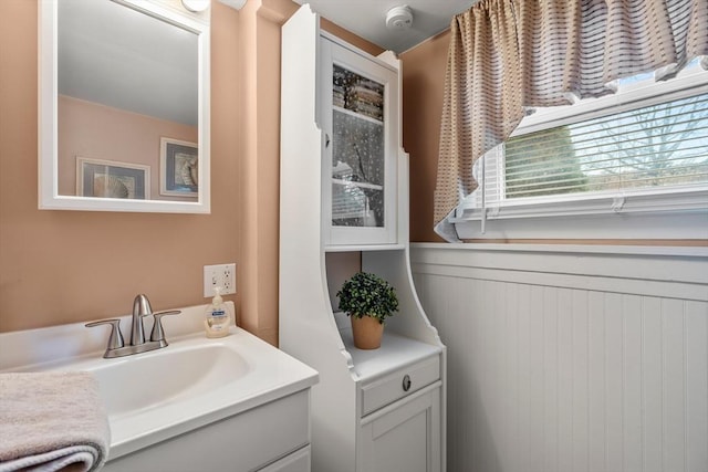 bathroom featuring wainscoting and vanity