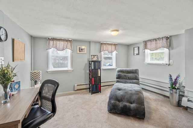 carpeted home office with baseboard heating and a textured ceiling