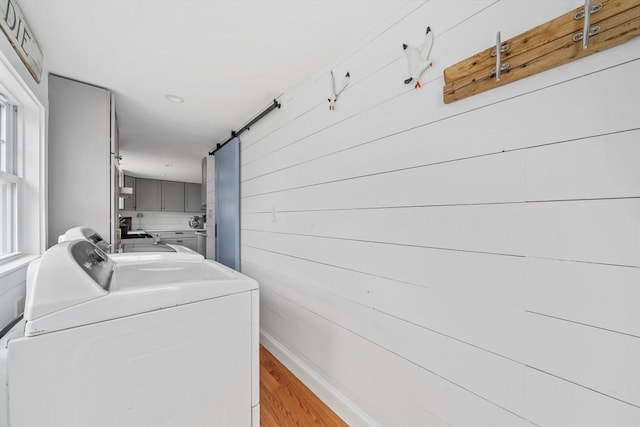 16 Squanto Rd, Weymouth, MA 02191 - washroom featuring washer and clothes dryer and light wood finished floors
