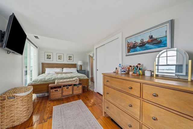 16 Squanto Rd, Weymouth, MA 02191 - bedroom with light wood-style flooring and a closet