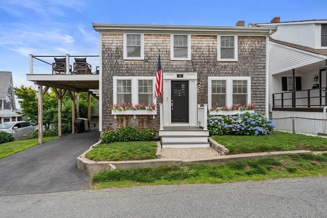 16 Squanto Rd, Weymouth, MA 02191 - view of front of house with asphalt driveway and a carport