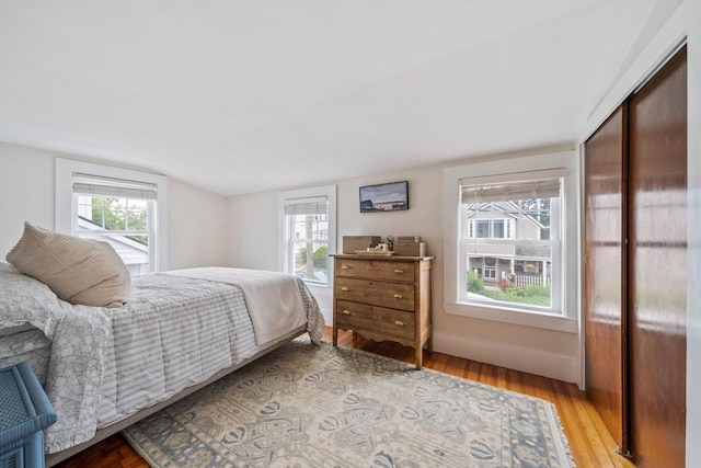 16 Squanto Rd, Weymouth, MA 02191 - bedroom featuring vaulted ceiling and light wood finished floors