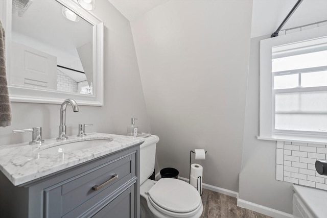 16 Squanto Rd, Weymouth, MA 02191 - bathroom featuring wood finished floors, vanity, a bath, and a shower