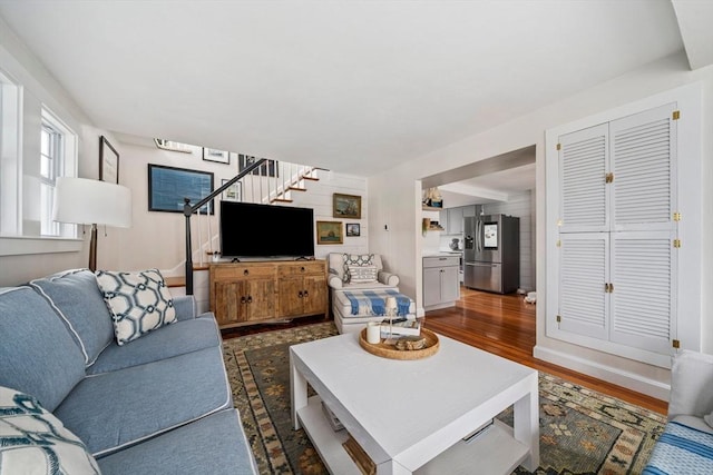16 Squanto Rd, Weymouth, MA 02191 - living area featuring stairway and dark wood-style floors