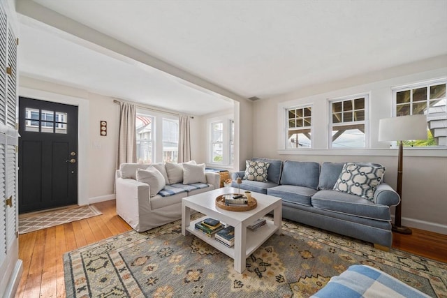 16 Squanto Rd, Weymouth, MA 02191 - living area featuring light wood-style flooring and plenty of natural light