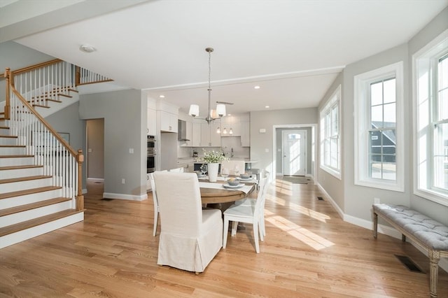 62 High St Lot 1, Stoneham, MA 02180 - dining space featuring stairs, a chandelier, light wood-type flooring, and recessed lighting