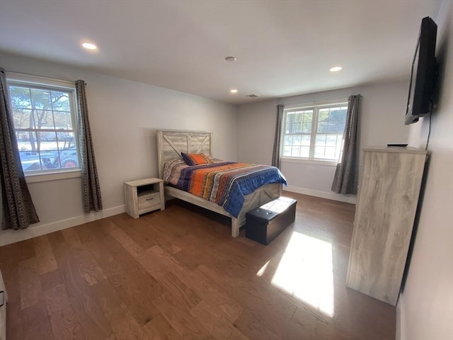 bedroom with wood-type flooring