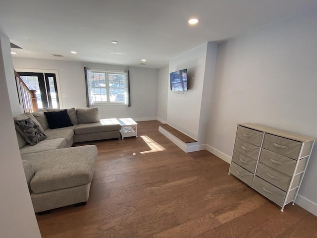 living room with dark wood-type flooring