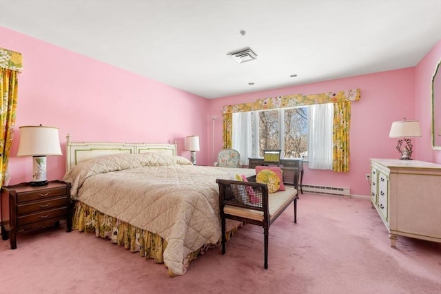 bedroom featuring light carpet and baseboard heating