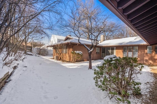 view of snow covered property