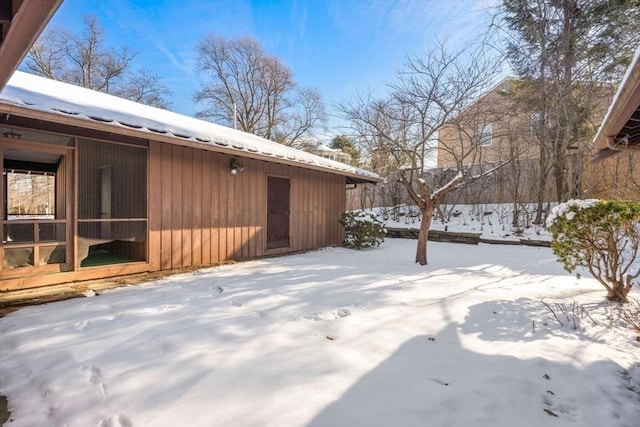 view of yard covered in snow