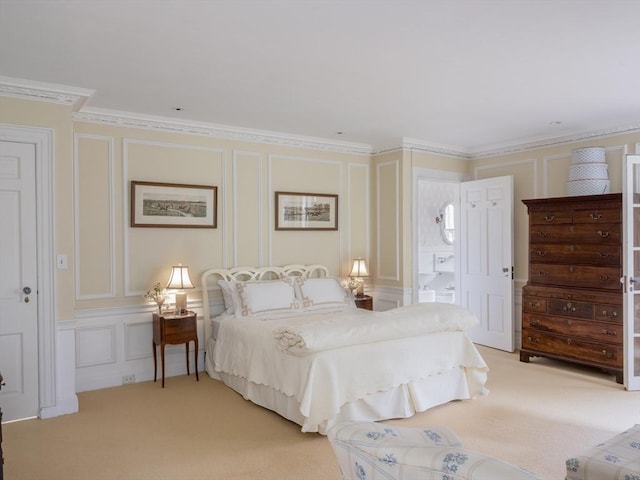 bedroom with light carpet and crown molding