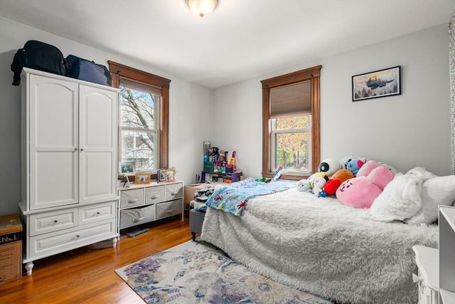 bedroom featuring wood finished floors