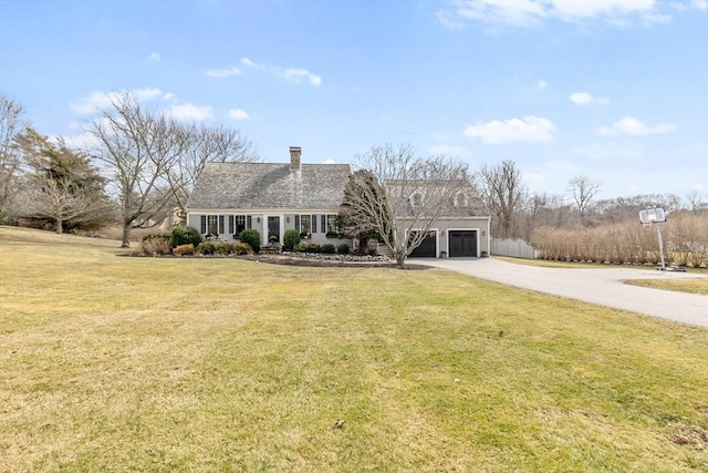 view of front of house with a front lawn, concrete driveway, an attached garage, a shingled roof, and a chimney