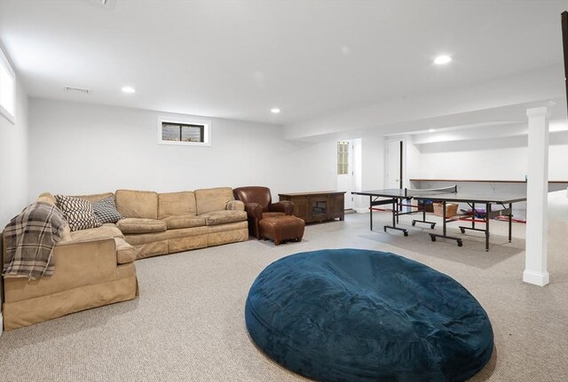 living room with visible vents, recessed lighting, and carpet