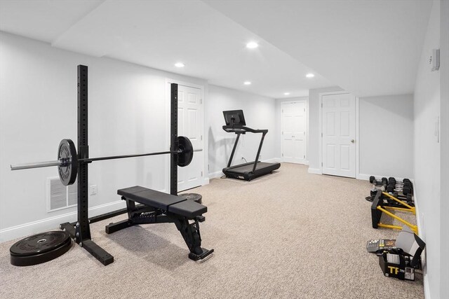 exercise area with visible vents, recessed lighting, baseboards, and carpet floors