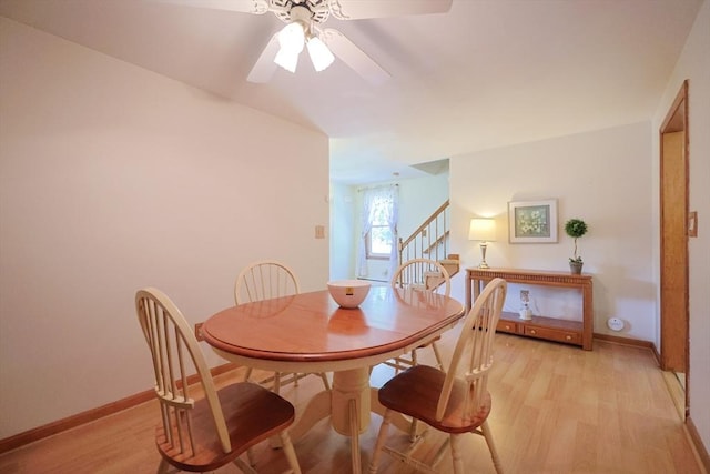 439 S St Unit A, Plainville, MA 02762 - dining area featuring light wood finished floors, stairs, and ceiling fan