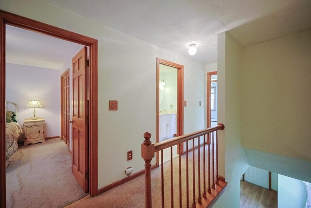 439 S St Unit A, Plainville, MA 02762 - corridor with an upstairs landing and light colored carpet
