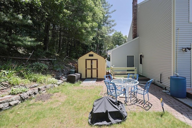 439 S St Unit A, Plainville, MA 02762 - view of grassy yard featuring a shed and a patio area