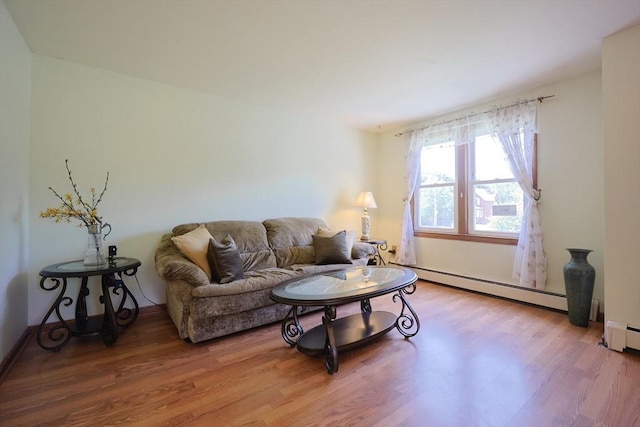 439 S St Unit A, Plainville, MA 02762 - living room with a baseboard radiator and wood finished floors