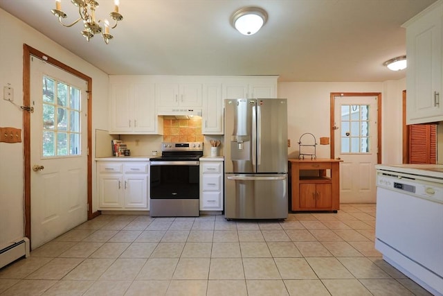 439 S St Unit A, Plainville, MA 02762 - kitchen featuring stainless steel appliances, under cabinet range hood, a baseboard radiator, light countertops, and a chandelier