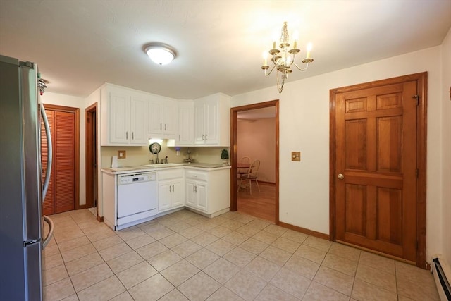 439 S St Unit A, Plainville, MA 02762 - kitchen featuring white dishwasher, freestanding refrigerator, a chandelier, light countertops, and white cabinets