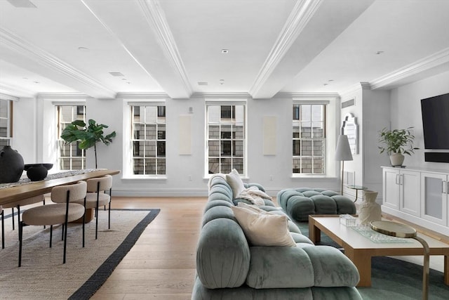 living room featuring light hardwood / wood-style flooring and ornamental molding