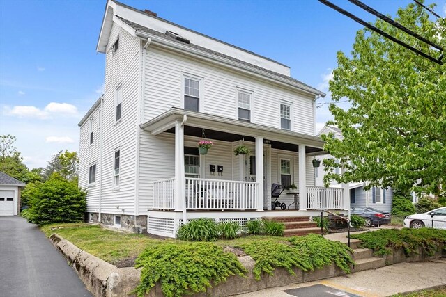 28 Gardner St, Arlington, MA 02474 - view of front of property featuring covered porch