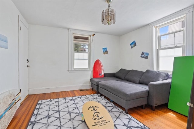 28 Gardner St, Arlington, MA 02474 - living room with light wood-style floors and baseboards