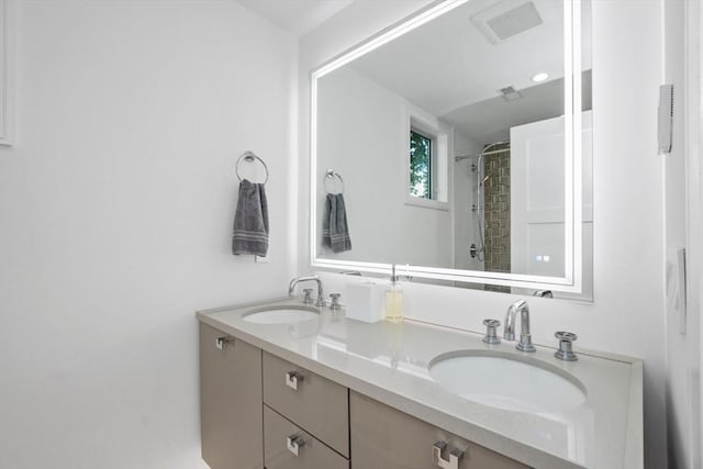 62 Pearl Unit 62, Cambridge, MA 02139 - bathroom with double vanity and tiled shower